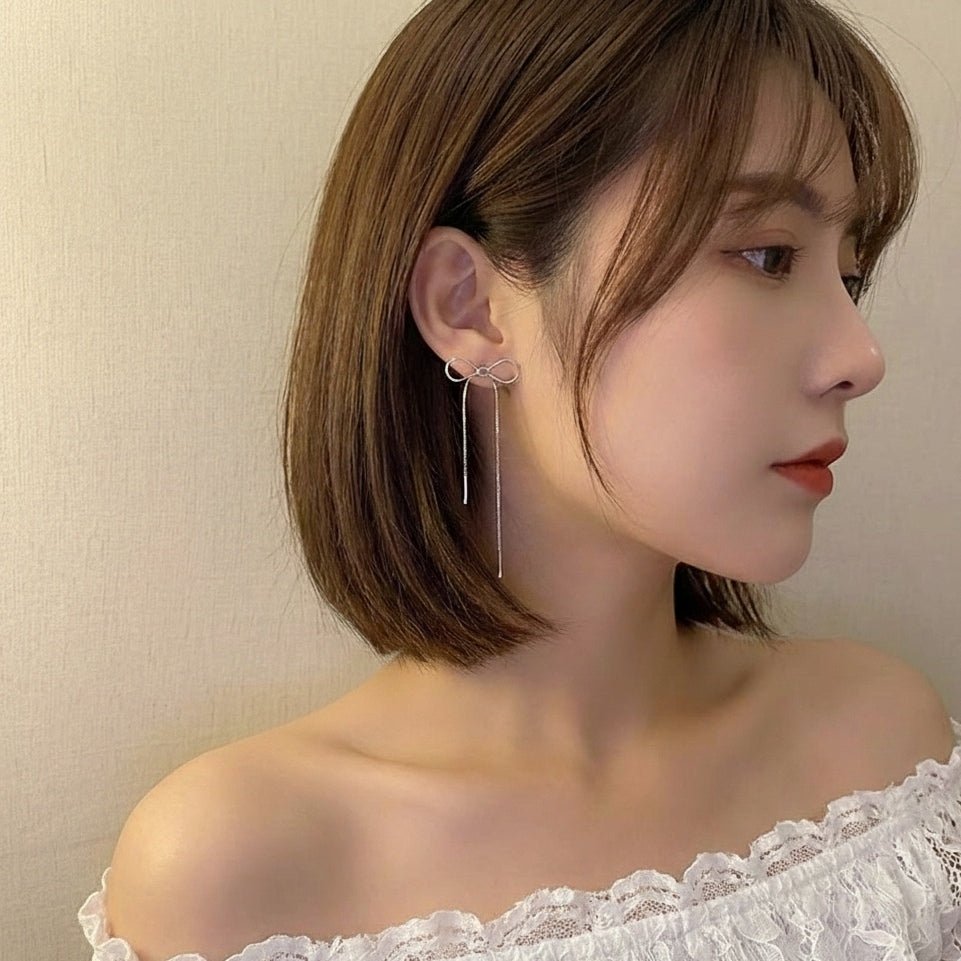 揺れるリボン シルバーの輝き レイヤードフリンジピアス